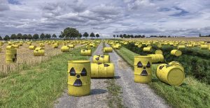 trash cans scattered in field